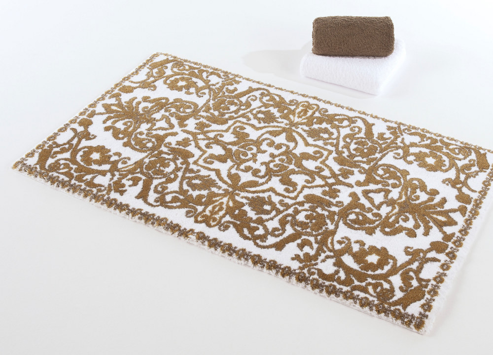 Abyss Habidecor Perse Gold Bath Rugs. Gold and White scroll pattern rugs