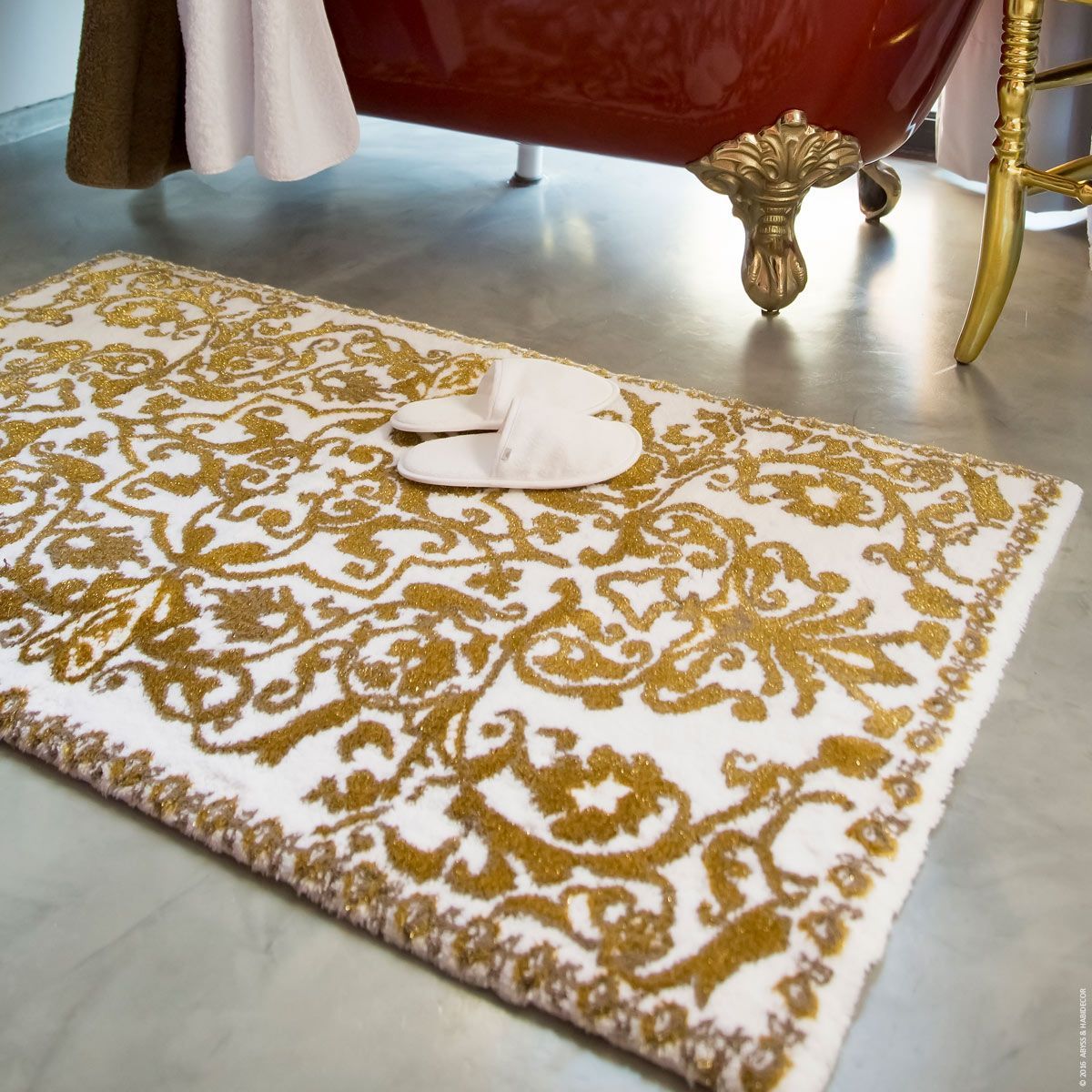 Abyss Habidecor Perse Gold Bath Rugs. Gold and White scroll pattern rugs