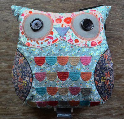 https://www.jbrulee.com/prod_images_large/cynthia-rowley-embroidered-patchwork-owl-pillow.JPG